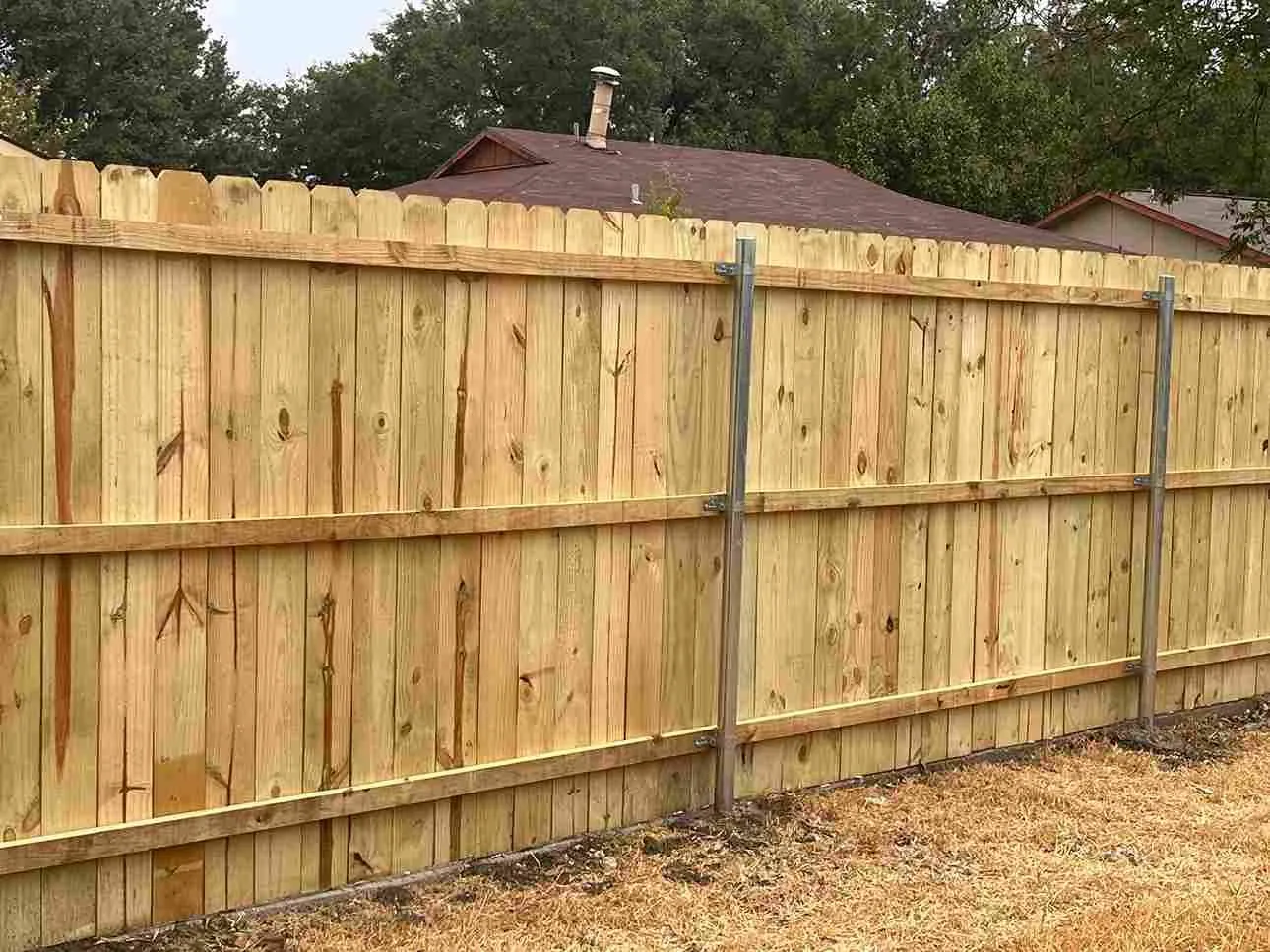 Wood and metal fence