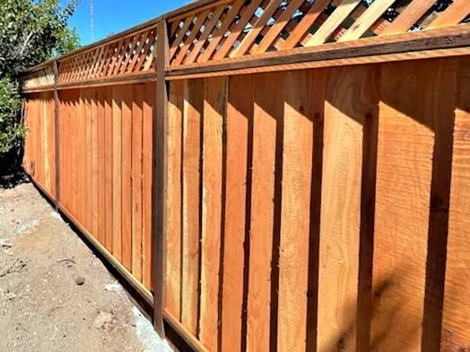 Louvered wood fence